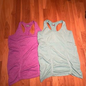 2 Athleta Fastest Track tanks xl - great for maternity too!